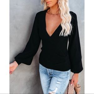 NWOT black wrapped knit sweater, low v, balloon sleeve detail